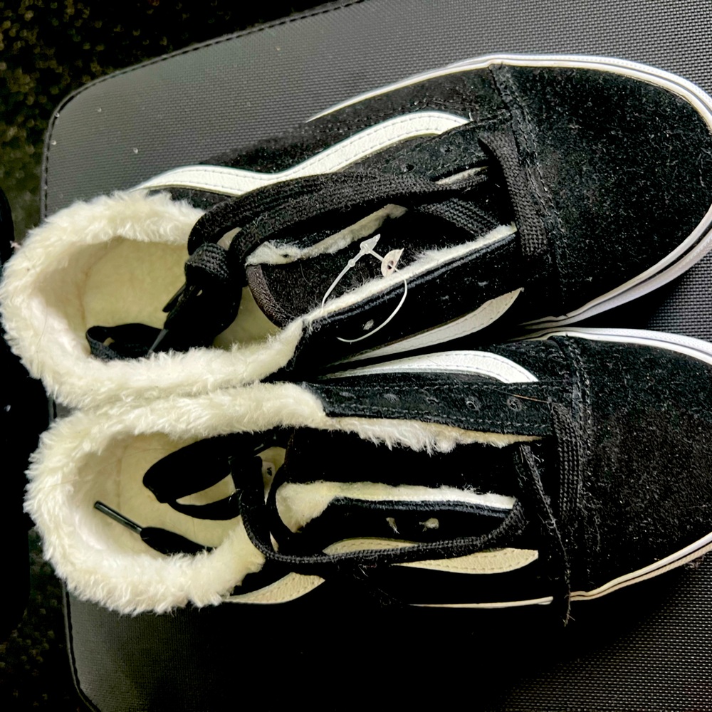 Slip on vans with inside faux fur…never worn